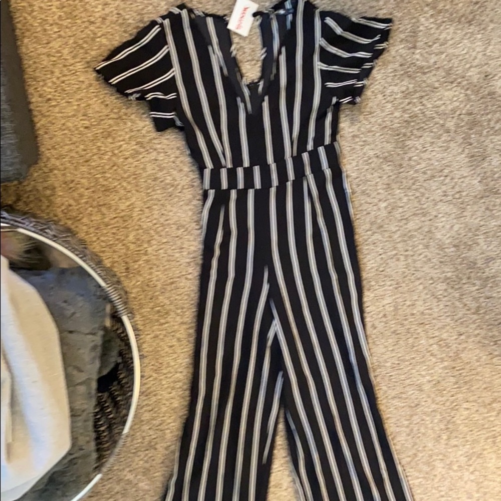 Black and white striped jump suit